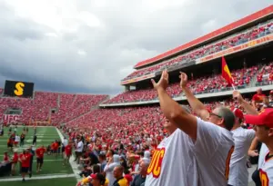 USC Trojans celebrating their victory against Purdue Boilermakers with fans in a packed stadium.
