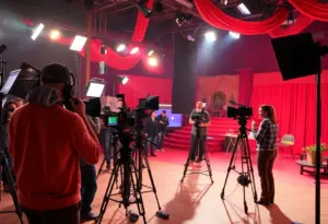 A film production set in California with crew members and equipment