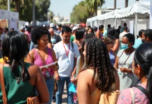 A community health fair in Los Angeles with people participating in health activities.